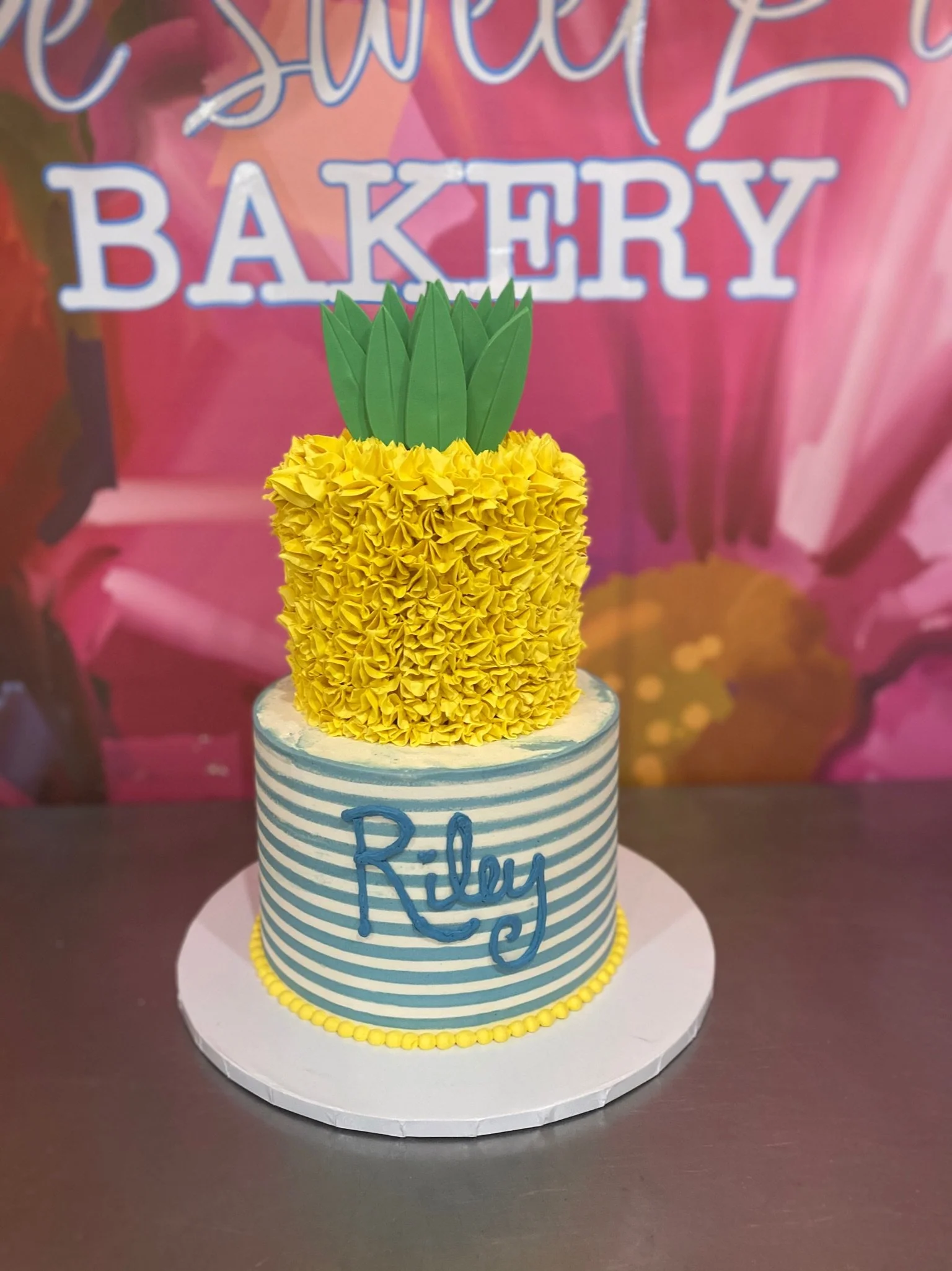 Yellow blue baby shower teddy bear cake