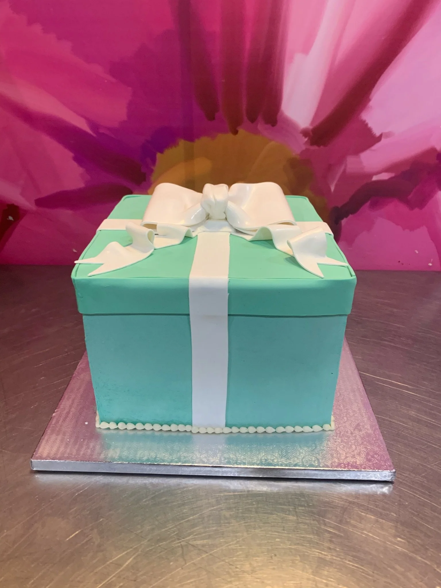 White turquoise green baby shower gift box cake