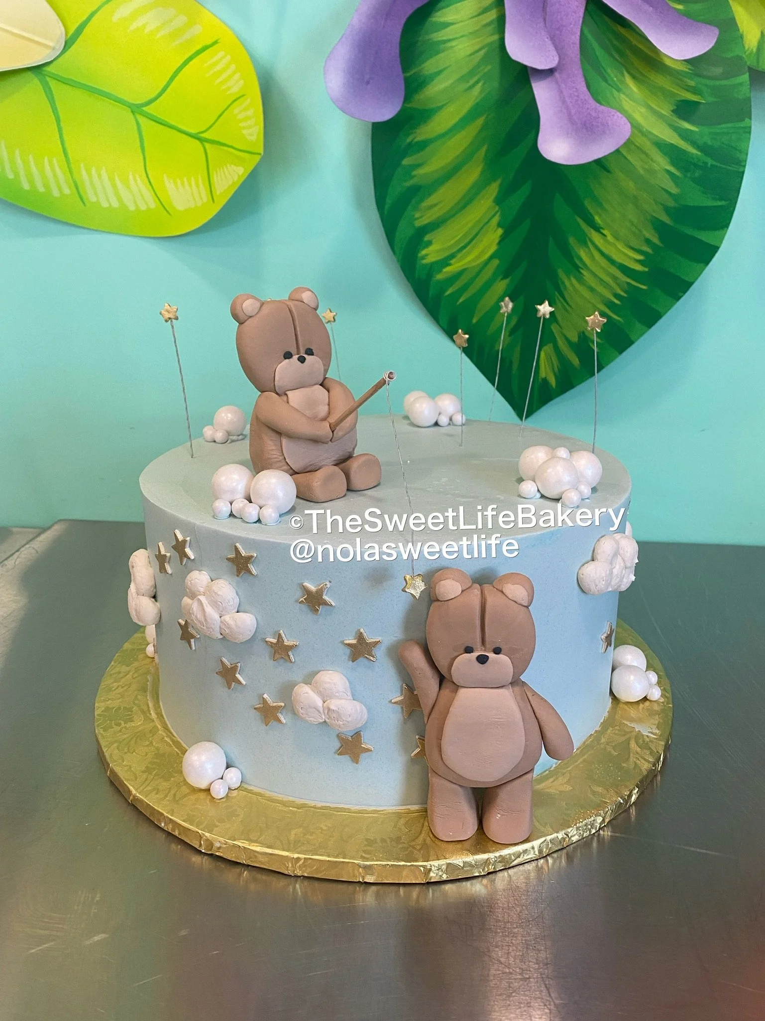 Blue white baby shower woodland animals cake