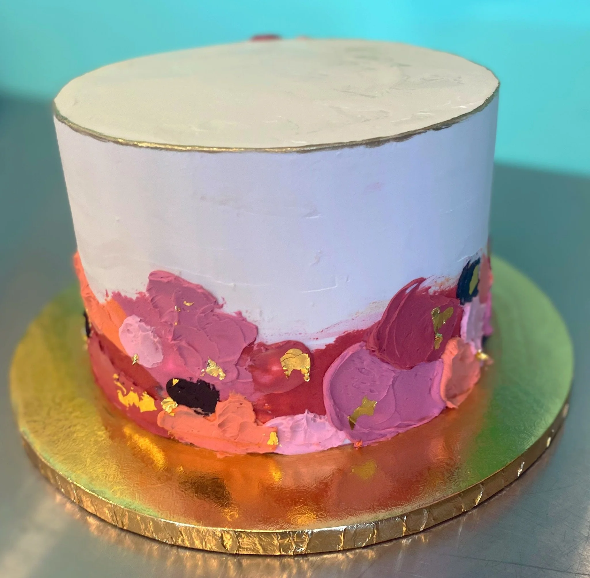 White floral baby shower cake colorful paint flowers